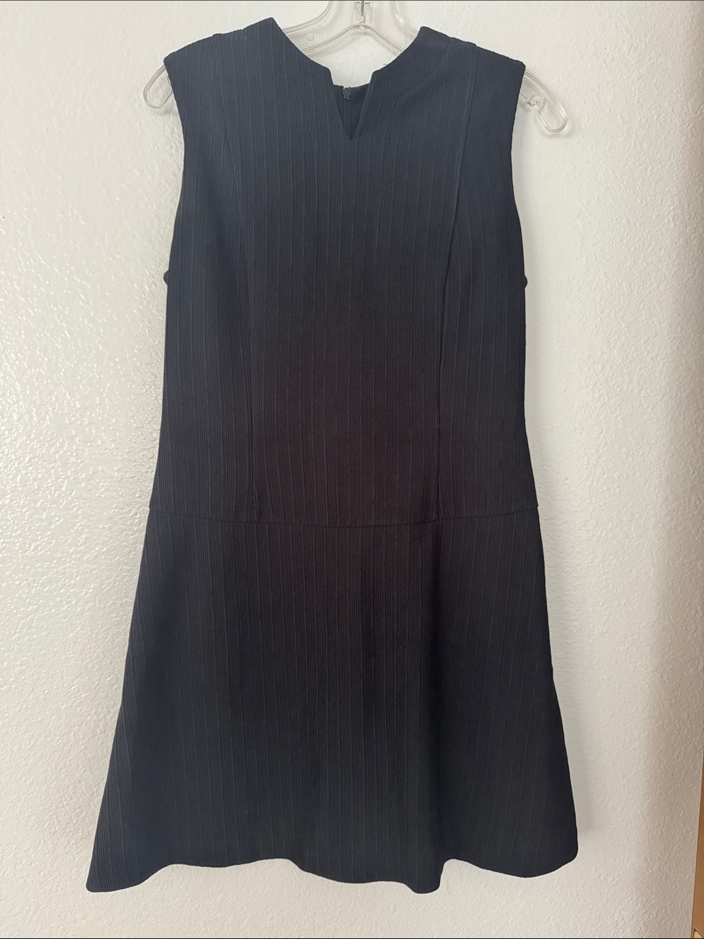 Sleeveless Black Mini Dress with V-Notch Neckline